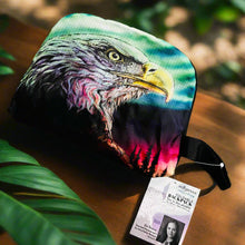 Load image into Gallery viewer, Colorful backpack with an eagle design on a brown surface