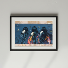 Load image into Gallery viewer, Framed artwork of three figures with wings on a starry night sky background, mounted on a white wall.
