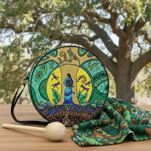 Load image into Gallery viewer, Round bag with artistic design featuring a woman and nature elements on a white background