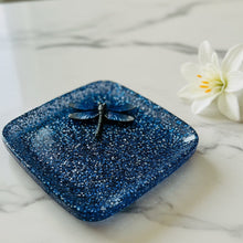 Load image into Gallery viewer, Blue speckled ceramic dish with a dragonfly on a marble surface