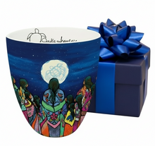 Load image into Gallery viewer, Colorful mug with artistic design and blue gift box on a wooden surface