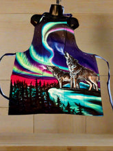 Load image into Gallery viewer, Apron with a wolf and Northern Lights design on a textured surface