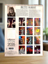 Load image into Gallery viewer, 2026 calendar by Betty Albert with artistic images on a brown background