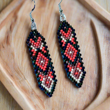 Load image into Gallery viewer, Pair of beaded earrings on a wooden surface