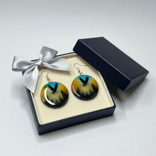 Load image into Gallery viewer, Pair of earrings in a decorative box with a bow on a light gray background