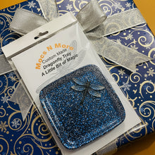 Load image into Gallery viewer, Blue glittery dragonfly tray in clear packaging on a brown background
