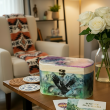 Load image into Gallery viewer, Decorative box with an eagle design on a table in a living room setting.