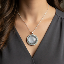 Load image into Gallery viewer, Brilliant Pendant Necklace on model with dark grey blouse