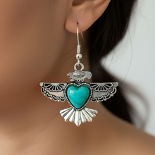 Load image into Gallery viewer, Close-up of New Thunderbird Calling Earrings being worn