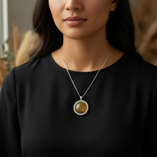 Load image into Gallery viewer, Daring Pendant on Indigenous model - black blouse
