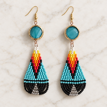 Load image into Gallery viewer, Earrings arranged on warm white marble
