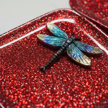 Load image into Gallery viewer, Extreme close-up of red glitter and wing texture