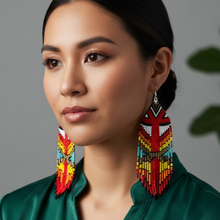 Load image into Gallery viewer, Fancy Dancer Earrings close-up - forest green blouse