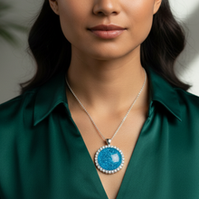 Load image into Gallery viewer, Freedom Pendant on Indigenous model - forest green blouse