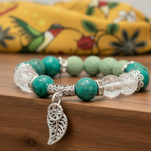 Load image into Gallery viewer, Green Howlite Bracelet with Yellow Hummingbird Scarf on Walnut Ledge
