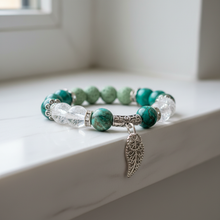 Load image into Gallery viewer, Green Howlite Fancy Feather on White Ledge