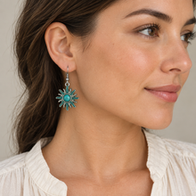 Load image into Gallery viewer, Turquoise Sunshine Drop Earring worn with a cream blouse
