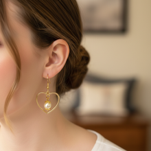 Load image into Gallery viewer, Pearl Bloom Heart Earrings worn on model
