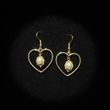 Load image into Gallery viewer, Pearl Bloom Heart Earrings on dark velvet