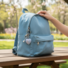 Load image into Gallery viewer, Moonstone Heart Keychain on a backpack zipper