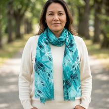 Load image into Gallery viewer, Indigenous model wearing the dragonfly scarf outdoors