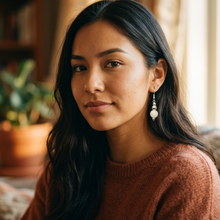 Load image into Gallery viewer, Lifestyle photo of the small dainty earrings on an Indigenous model