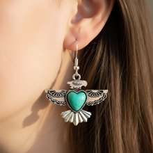 Load image into Gallery viewer, Macro close-up of New Thunderbird Calling Earrings from angle