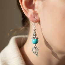 Load image into Gallery viewer, Macro close-up of Turquoise and Silver Earrings from angle