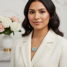 Load image into Gallery viewer, Majestic Pendant on Indigenous model - cream blouse
