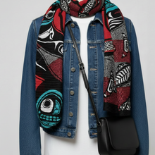 Load image into Gallery viewer, Colorful patterned scarf draped over a denim jacket with a black bag.