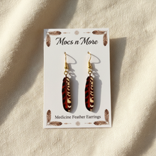 Load image into Gallery viewer, Mocs n More Medicine Feather Earrings on Creamy Cotton Cloth