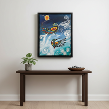 Load image into Gallery viewer, Framed artwork of a colorful bird on a wall above a wooden table with a plant and bowl.