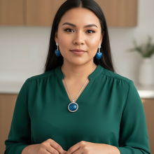 Load image into Gallery viewer, Sapphire Blue Set on Indigenous model - forest green blouse