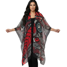 Load image into Gallery viewer, A woman modeling a lightweight open-front shawl with a bold red, black, and gray Indigenous-inspired geometric and fish pattern against a plain white background.