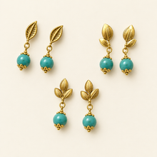 Load image into Gallery viewer, Three earring styles on an ivory background