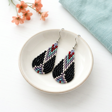 Load image into Gallery viewer, Wind Talker earrings on an ivory dish